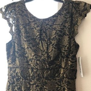 Flattering Black and Gold Lace Dress by Allen B.